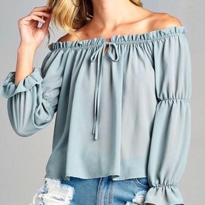 Sage green on/off the shoulder shirt.